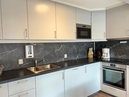 ห้องครัว, เบรคเกอ อพาร์ตเมนต์ (Brekke Apartments) in ฟลาม