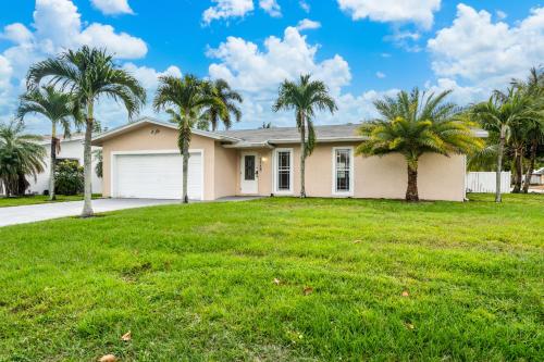 Gorgeous open concept 4 BR with heated pool and lounge area