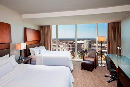 Guest room, 2 Queen, Limited view, Mid floor image 3