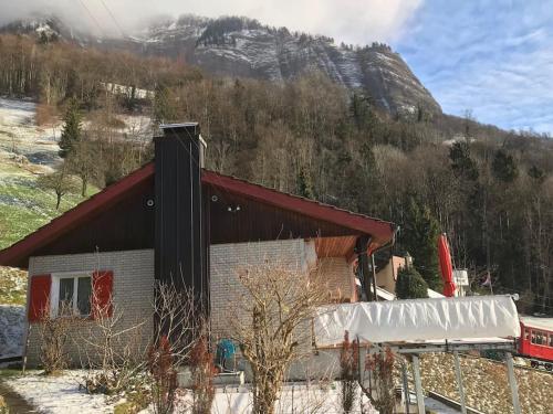 Cozy House above Lake Lucerne in car-free Vitznau Mittlerschwanden at Mount Rigi railway