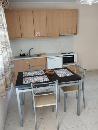 Kitchen, ROMVI VILLAGE in Dexamenes