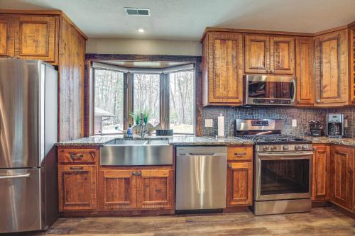 Waterfront Eagle River Lake Home with Boat Dock - image 11