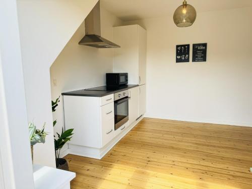 廚房, aday - 1 bedroom balcony apartment on the pedestrian street in Randers in 蘭納斯市中心