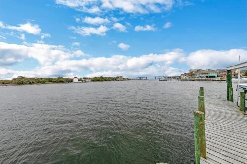 Completely Coastal Spacious townhome with Harbor views a Dock and community Pool