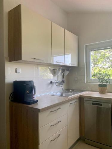 Three-Bedroom Apartment with Terrace and Sea View image 1