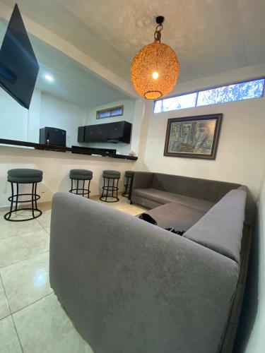 Shared lounge/TV area, Mahalo Hostel in Salento