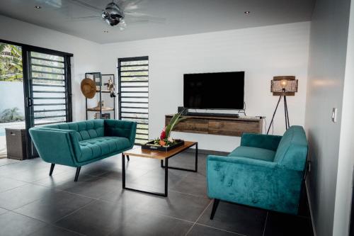 ห้องส่วนกลางสำหรับนั่งเล่น/ดูทีวี, Secret Pearls by Matira Beach in นูนวย