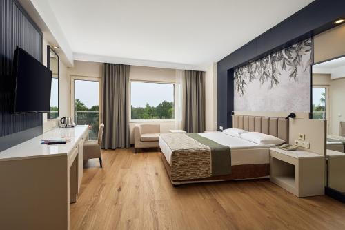 Quarto duplo ou twin, vista parcial para o mar