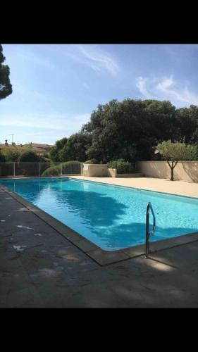 Maison et jardin dans résidence avec piscine - Location saisonnière - Cavalaire-sur-Mer