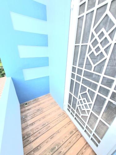 Balcony/terrace, Zizi Homey at Cemara Asri in Medan Timur