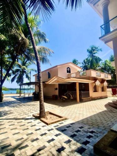 Cozinn B205 4bhk Riverfront Villa with beach view