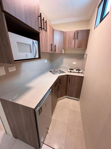 Cocina, Suitesecu Rentals Guayaquil in Guayaquil