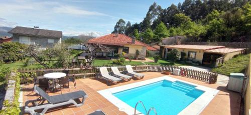Casa Rural Pontevedra con piscinajardínbarbacoa gîte à louer Cobres