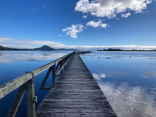 Whare&geothermal pool by lake Taupo in Turangi