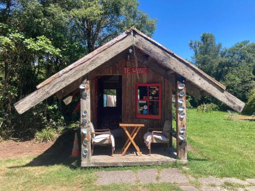 Whare&geothermal pool by lake Taupo in Turangi