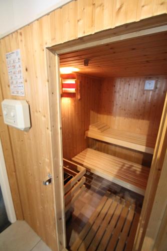 Karin's kruidenhoeve B&B kamer Kamille met Finse sauna