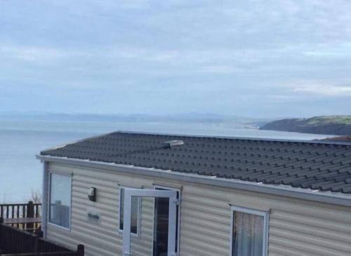 Caravan with Uninterrupted Sea Views - Large Deck - Havens Quay West New Quay West Wales