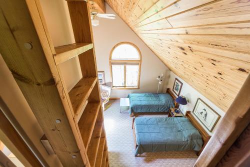 Gebhard Chalet - Charming, private, beachfront chalet nestled in a wooded dune on Lake Michigan