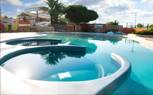 Bungalow de 3 chambres avec piscine partagee et terrasse amenagee a Canet en Roussillon - Location saisonnière - Canet-en-Roussillon