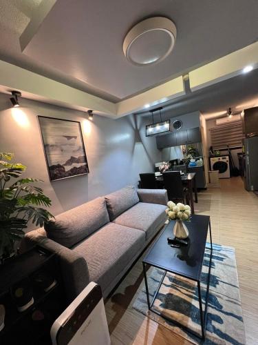 One Oasis Cozy condo beside Sm Ecoland - Tap to explore photos