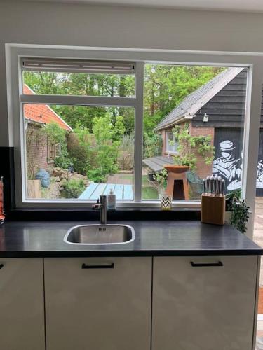 Bosrijke vrijstaande woning in Vennewater