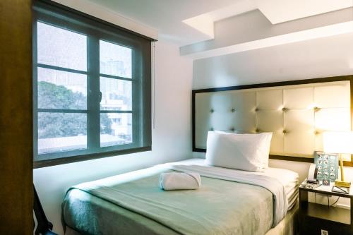 One Cristina Suites