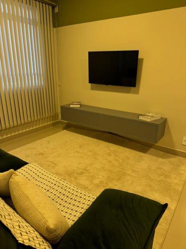 ห้องส่วนกลางสำหรับนั่งเล่น/ดูทีวี, Fantastico apto no Centro! in ฟรังกา