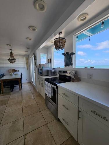 Moeʻuhane Kai Beach Front Home in Punaluu