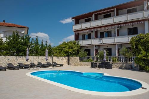 Apartments with swimming pool Lopar, Rab - 22978 – khách sạn tại Lopar