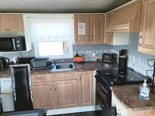 Konyha, Wright Choice caravan rental 5 Lunan View St Cyrus Caravan Park in St Cyrus