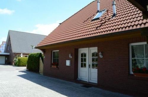 Ferienwohnung in Burhave mit Grill und Garten