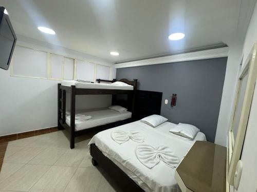 Quadruple Room with Private Bathroom image 1