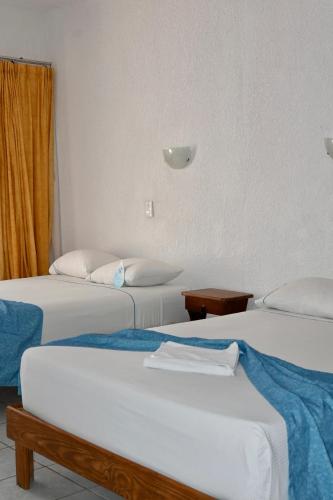 Pelicano Inn Playa del Carmen - Beachfront Hotel