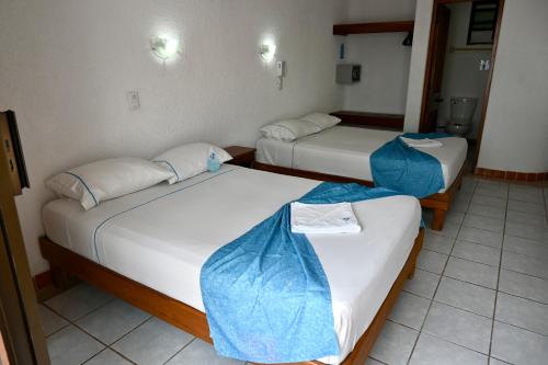 Pelicano Inn Playa del Carmen - Beachfront Hotel