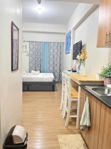 21st floor The Loop Condo Studio in Cagayan de Oro City Lucky 14 - Tap to explore photos