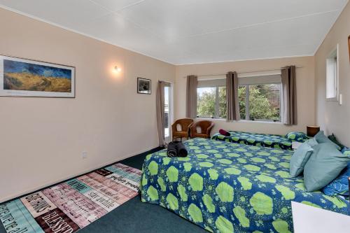 Sandy Cottage - Tokerau Beach Holiday Home