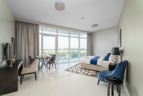 Nasma Luxury Stays - Charming Studio at DAMAC Hills Artesia Tower C, Дубай (фото 2)