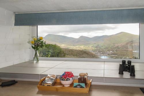 المنظر الخارجي, Fron Heulog Cottage in لانبرس