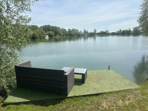 Indulgence lakeside lodge i1 with hot tub, private fishing peg situated at Tattershall Lakes Country Park