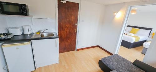 صالة مشتركة/ منطقة التلفزيون, mySTAYINN Inverness Guest House - Rooms in Dalneigh