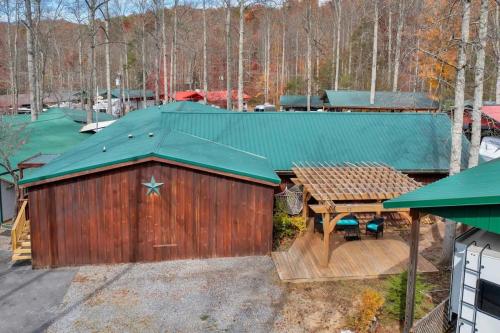 4BR Family Lodge in Gatlinburg with Hot Tub - image 13