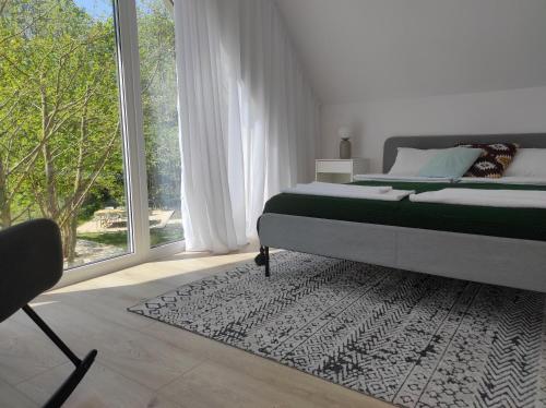 Źródlana Apartamenty - całoroczne domy na wyłączność