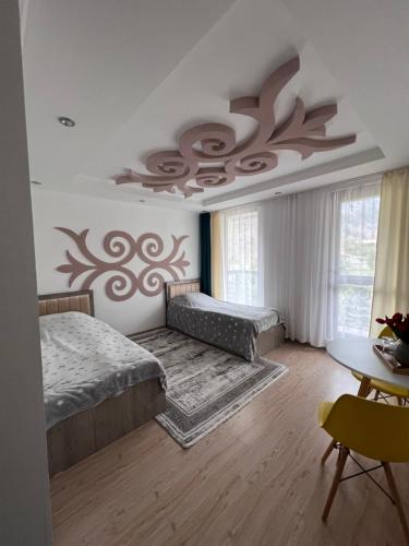 Tazabek guest house in Rot-Front