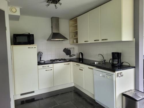 Holiday Home Friesland near the Wadden Sea with Wifi and 3 Bedrooms in Tzummarum