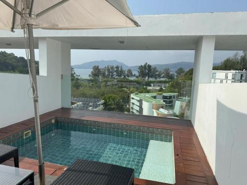 Sea view studio with private terrace & pool