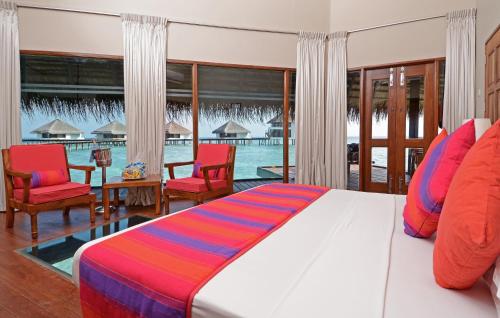 Sunset Water Villa with USD 50 Spa Credit Per Person | 10% Off on Excursions | FREE One Hour Sunset Photo Cruise for Minimum 3 Night Stays image 3