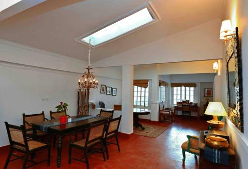 Shared lounge/TV area, Chhota Haazri, by The Rajbari Bawali in Ghoom Pahar Forest