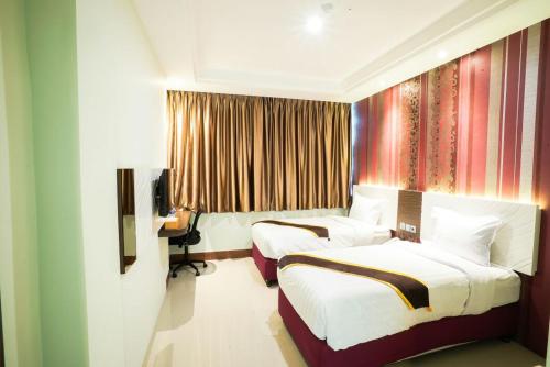 Hotel Grand Citra Makassar - Tap to explore photos