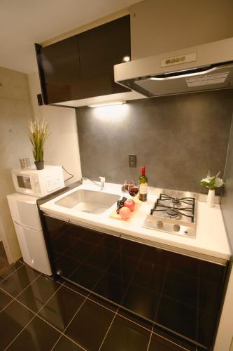 FL Residence Seeikokan III, Токио (фото 8)