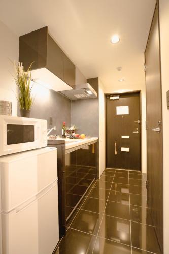 FL Residence Seeikokan III, Токио (фото 9)